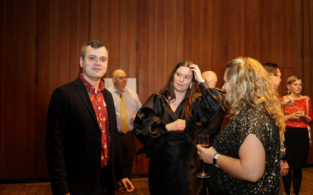 Business professionals shaking hands at a corporate networking event