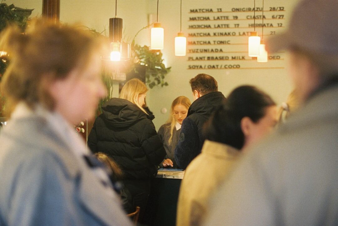 Networking reception at a professional business event with people talking